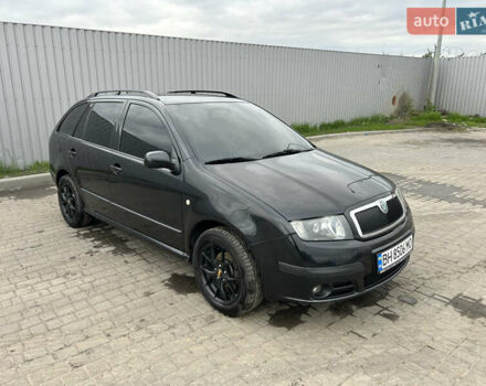 Черный Шкода Фабия, объемом двигателя 1.39 л и пробегом 226 тыс. км за 3900 $, фото 1 на Automoto.ua