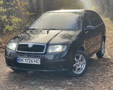 Черный Шкода Фабия, объемом двигателя 1.2 л и пробегом 380 тыс. км за 3100 $, фото 1 на Automoto.ua