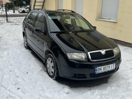 Черный Шкода Фабия, объемом двигателя 1.4 л и пробегом 270 тыс. км за 3950 $, фото 1 на Automoto.ua