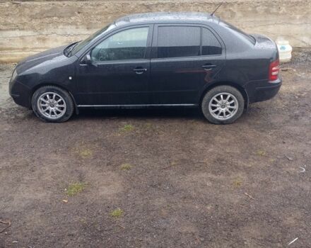 Черный Шкода Фабия, объемом двигателя 1.4 л и пробегом 162 тыс. км за 4000 $, фото 1 на Automoto.ua