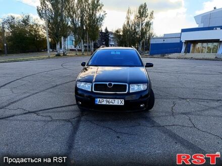 Черный Шкода Фабия, объемом двигателя 1.4 л и пробегом 238 тыс. км за 4500 $, фото 1 на Automoto.ua