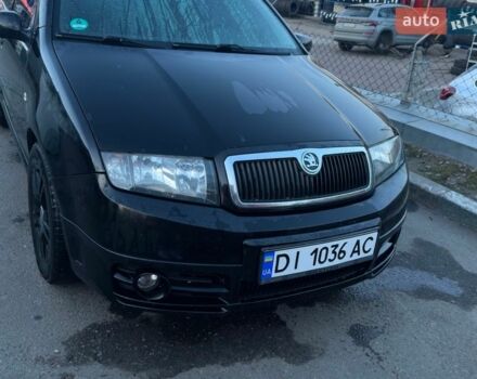 Черный Шкода Фабия, объемом двигателя 1.2 л и пробегом 278 тыс. км за 3300 $, фото 1 на Automoto.ua