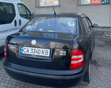 Черный Шкода Фабия, объемом двигателя 1.2 л и пробегом 244 тыс. км за 3500 $, фото 1 на Automoto.ua