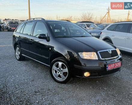 Черный Шкода Фабия, объемом двигателя 1.4 л и пробегом 200 тыс. км за 4999 $, фото 1 на Automoto.ua