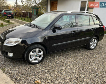 Черный Шкода Фабия, объемом двигателя 1.6 л и пробегом 203 тыс. км за 5850 $, фото 1 на Automoto.ua