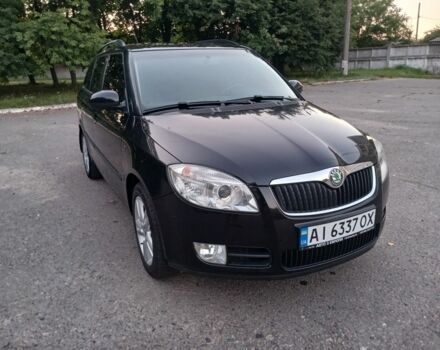 Черный Шкода Фабия, объемом двигателя 1.6 л и пробегом 203 тыс. км за 5700 $, фото 1 на Automoto.ua