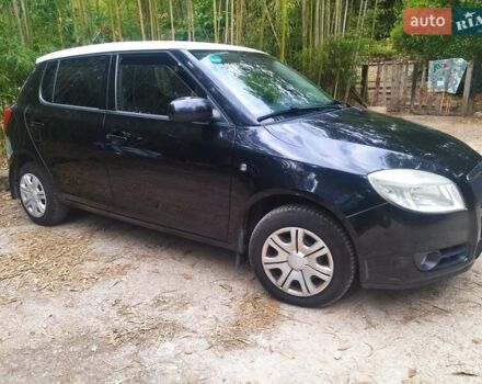 Черный Шкода Фабия, объемом двигателя 1.39 л и пробегом 260 тыс. км за 2800 $, фото 1 на Automoto.ua