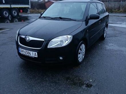 Черный Шкода Фабия, объемом двигателя 1.4 л и пробегом 205 тыс. км за 5999 $, фото 1 на Automoto.ua