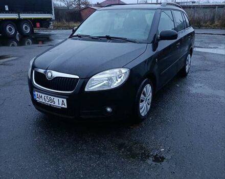 Черный Шкода Фабия, объемом двигателя 1.4 л и пробегом 205 тыс. км за 5999 $, фото 1 на Automoto.ua