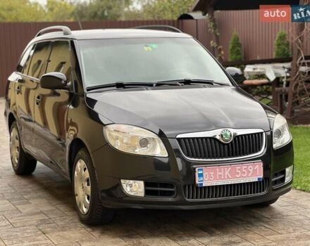 Черный Шкода Фабия, объемом двигателя 1.6 л и пробегом 216 тыс. км за 5900 $, фото 1 на Automoto.ua