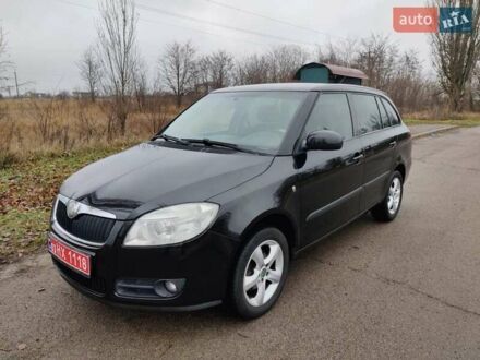 Черный Шкода Фабия, объемом двигателя 1.4 л и пробегом 201 тыс. км за 5750 $, фото 1 на Automoto.ua