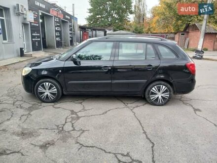 Черный Шкода Фабия, объемом двигателя 1.4 л и пробегом 194 тыс. км за 5500 $, фото 1 на Automoto.ua