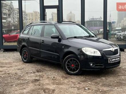 Черный Шкода Фабия, объемом двигателя 1.39 л и пробегом 124 тыс. км за 5490 $, фото 1 на Automoto.ua