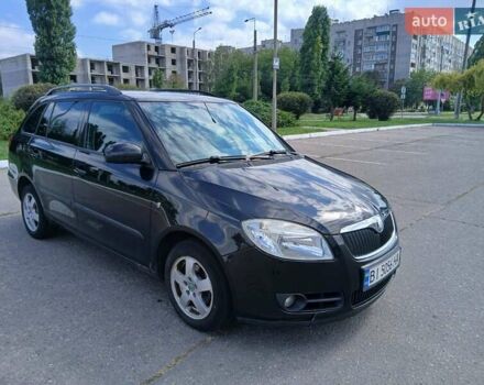 Черный Шкода Фабия, объемом двигателя 1.39 л и пробегом 247 тыс. км за 5200 $, фото 1 на Automoto.ua
