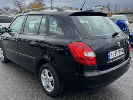Черный Шкода Фабия, объемом двигателя 1.42 л и пробегом 210 тыс. км за 5777 $, фото 1 на Automoto.ua