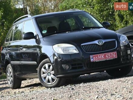 Черный Шкода Фабия, объемом двигателя 1.4 л и пробегом 235 тыс. км за 5800 $, фото 1 на Automoto.ua
