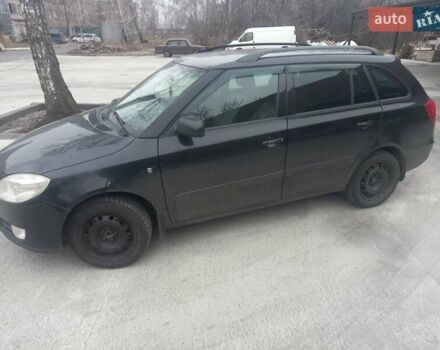 Черный Шкода Фабия, объемом двигателя 1.6 л и пробегом 211 тыс. км за 5500 $, фото 1 на Automoto.ua