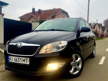 Черный Шкода Фабия, объемом двигателя 1.2 л и пробегом 243 тыс. км за 5300 $, фото 1 на Automoto.ua