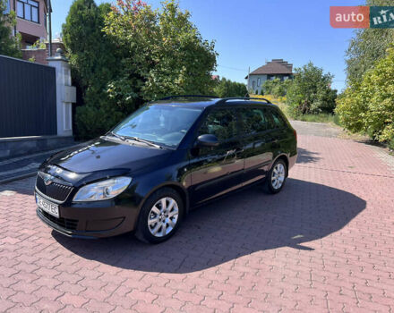 Черный Шкода Фабия, объемом двигателя 1.6 л и пробегом 275 тыс. км за 4900 $, фото 1 на Automoto.ua