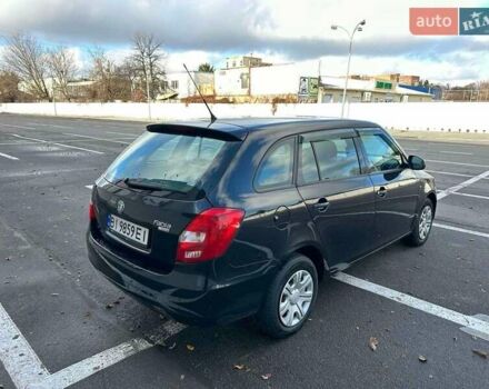 Черный Шкода Фабия, объемом двигателя 1.6 л и пробегом 195 тыс. км за 5500 $, фото 1 на Automoto.ua
