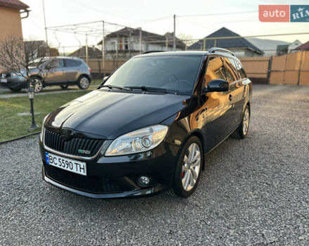 Черный Шкода Фабия, объемом двигателя 1.4 л и пробегом 205 тыс. км за 7650 $, фото 1 на Automoto.ua