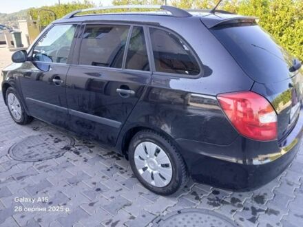 Черный Шкода Фабия, объемом двигателя 1.2 л и пробегом 180 тыс. км за 5954 $, фото 1 на Automoto.ua