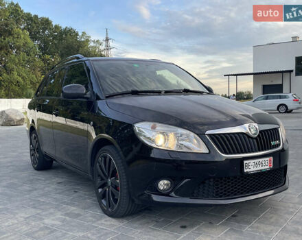 Черный Шкода Фабия, объемом двигателя 1.4 л и пробегом 179 тыс. км за 7750 $, фото 1 на Automoto.ua