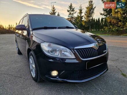 Черный Шкода Фабия, объемом двигателя 1.4 л и пробегом 225 тыс. км за 8600 $, фото 1 на Automoto.ua