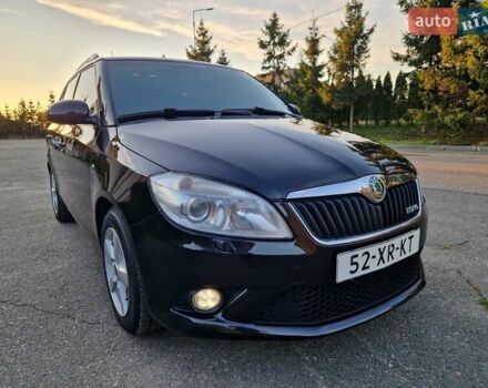 Черный Шкода Фабия, объемом двигателя 1.4 л и пробегом 225 тыс. км за 8600 $, фото 1 на Automoto.ua
