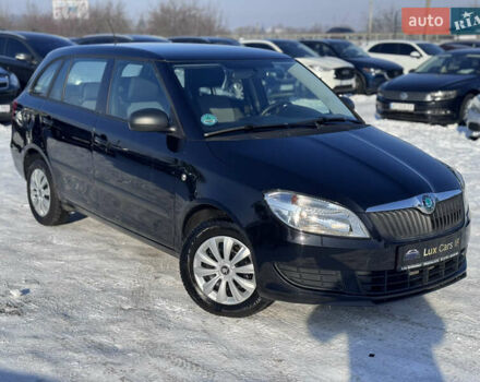 Черный Шкода Фабия, объемом двигателя 1.2 л и пробегом 210 тыс. км за 5500 $, фото 1 на Automoto.ua