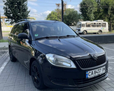 Черный Шкода Фабия, объемом двигателя 1.6 л и пробегом 226 тыс. км за 5999 $, фото 1 на Automoto.ua