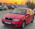 Красный Шкода Фабия, объемом двигателя 1.4 л и пробегом 227 тыс. км за 2700 $, фото 1 на Automoto.ua