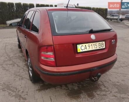 Красный Шкода Фабия, объемом двигателя 1.4 л и пробегом 237 тыс. км за 2500 $, фото 8 на Automoto.ua