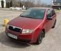 Красный Шкода Фабия, объемом двигателя 1.39 л и пробегом 315 тыс. км за 2950 $, фото 1 на Automoto.ua