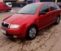 Красный Шкода Фабия, объемом двигателя 1.4 л и пробегом 240 тыс. км за 3100 $, фото 1 на Automoto.ua