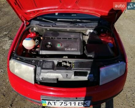 Красный Шкода Фабия, объемом двигателя 1.39 л и пробегом 229 тыс. км за 2600 $, фото 1 на Automoto.ua