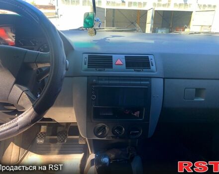 Красный Шкода Фабия, объемом двигателя 1.4 л и пробегом 260 тыс. км за 2450 $, фото 6 на Automoto.ua