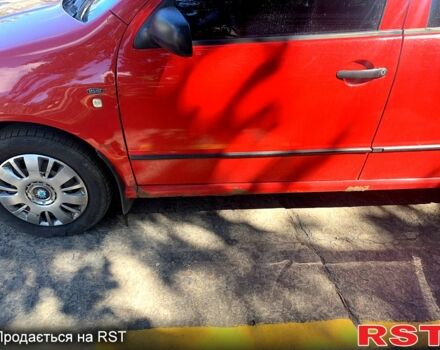 Красный Шкода Фабия, объемом двигателя 1.4 л и пробегом 260 тыс. км за 2450 $, фото 3 на Automoto.ua