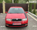 Красный Шкода Фабия, объемом двигателя 1.4 л и пробегом 190 тыс. км за 3950 $, фото 1 на Automoto.ua