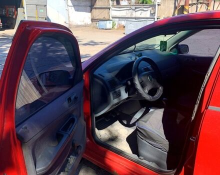 Красный Шкода Фабия, объемом двигателя 1.4 л и пробегом 260 тыс. км за 2450 $, фото 4 на Automoto.ua
