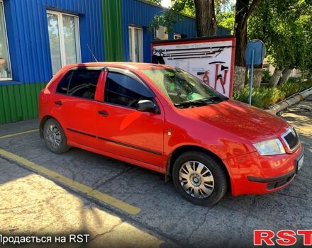 Красный Шкода Фабия, объемом двигателя 1.4 л и пробегом 260 тыс. км за 2450 $, фото 1 на Automoto.ua
