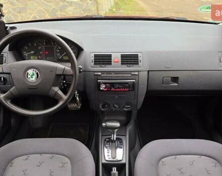 Червоний Шкода Фабія, об'ємом двигуна 1.39 л та пробігом 130 тис. км за 5999 $, фото 1 на Automoto.ua