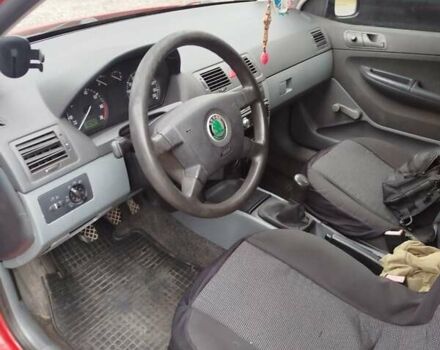 Красный Шкода Фабия, объемом двигателя 1.2 л и пробегом 295 тыс. км за 3000 $, фото 4 на Automoto.ua
