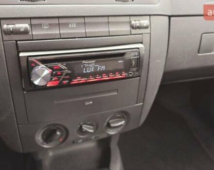 Червоний Шкода Фабія, об'ємом двигуна 1.39 л та пробігом 130 тис. км за 5999 $, фото 42 на Automoto.ua