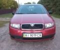 Червоний Шкода Фабія, об'ємом двигуна 1.2 л та пробігом 232 тис. км за 2200 $, фото 1 на Automoto.ua