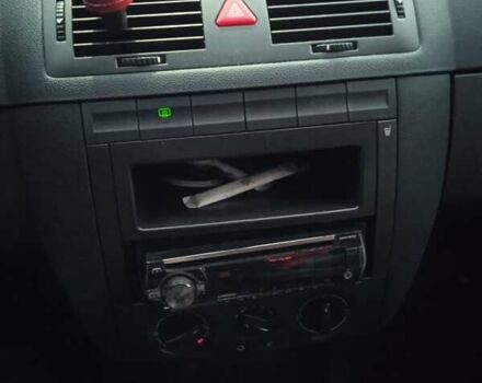 Красный Шкода Фабия, объемом двигателя 1.39 л и пробегом 226 тыс. км за 5400 $, фото 2 на Automoto.ua