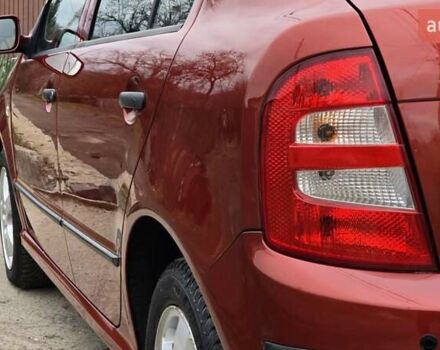 Червоний Шкода Фабія, об'ємом двигуна 1.39 л та пробігом 130 тис. км за 5999 $, фото 24 на Automoto.ua