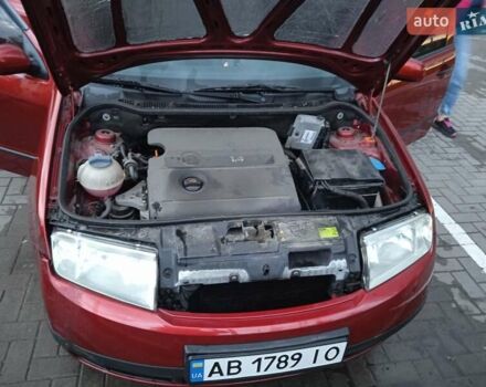 Красный Шкода Фабия, объемом двигателя 1.39 л и пробегом 226 тыс. км за 5400 $, фото 19 на Automoto.ua