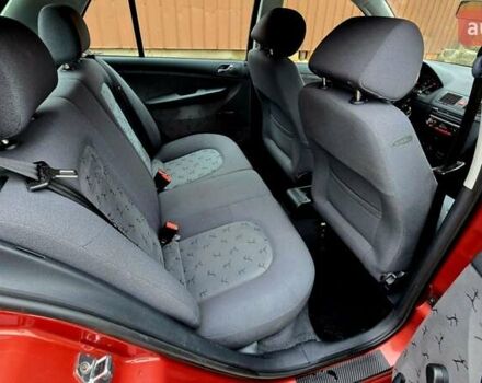 Червоний Шкода Фабія, об'ємом двигуна 1.39 л та пробігом 130 тис. км за 5999 $, фото 49 на Automoto.ua