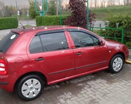 Красный Шкода Фабия, объемом двигателя 1.39 л и пробегом 226 тыс. км за 5400 $, фото 6 на Automoto.ua